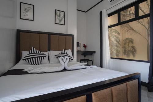 San Narciso Bed & Breakfast | The Palms Resort & Bar