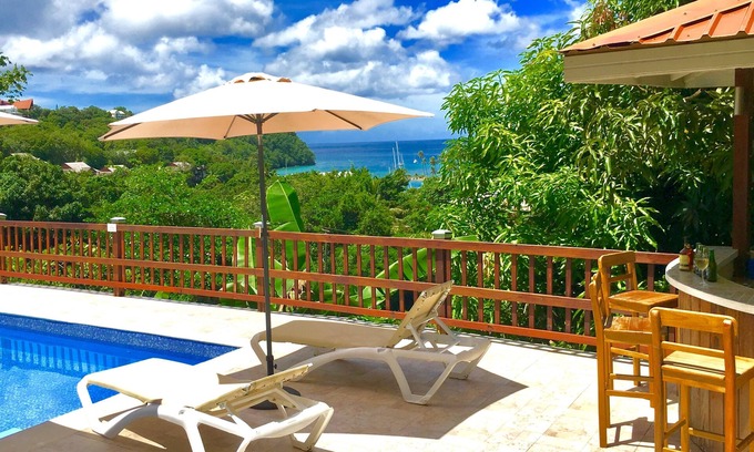 Marigot Bay Apartment | The Papaya suite is a relaxing retreat with fabulous views of Marigot Bay.