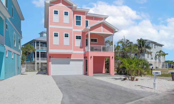 Fort Myers Beach House | The Pink Pearl: Chic beach house with Gulf access & sunset views—ideal Fort Myers Beach escape!