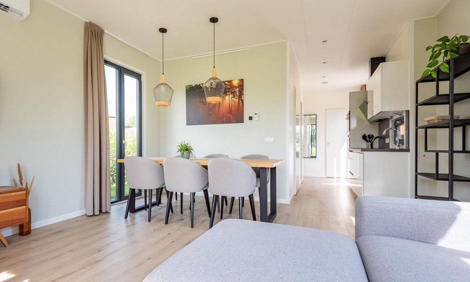 Lattrop House | The six-person holiday villa Amalia with private sauna has a spacious living room, open kitchen, three bedrooms and a spacious patio.