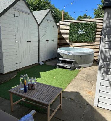 Churchtown House | The Telephone exchange very quaint hot tub stay