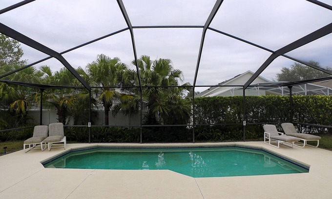 Bridgewater Crossing House | This 4/3 Pool Home at Bridgewater Crossing is perfection. Two masters with ensuites, game room, and more!