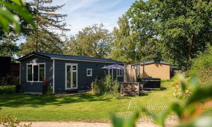 Zuna Cabin | This bungalow with hot tub has everything you need!