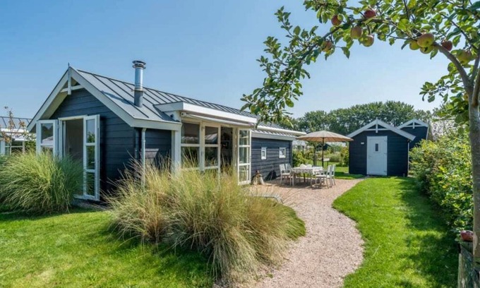 Westenschouwen House | This chalet has an extra spacious living room and two sitting areas, one of which is situated by the