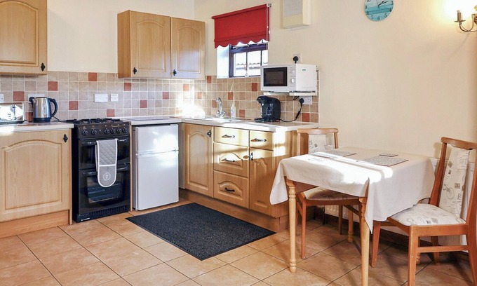 Poole Cottage | This charming detached cottages is the perfect getaway for a romantic trip.