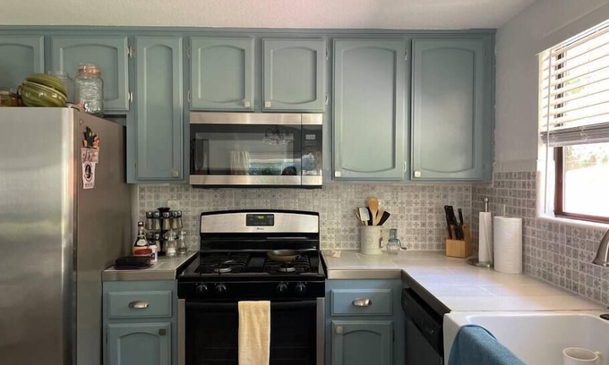 North Auburn House | This travel themed Room has a walk in closet, and Private bathroom