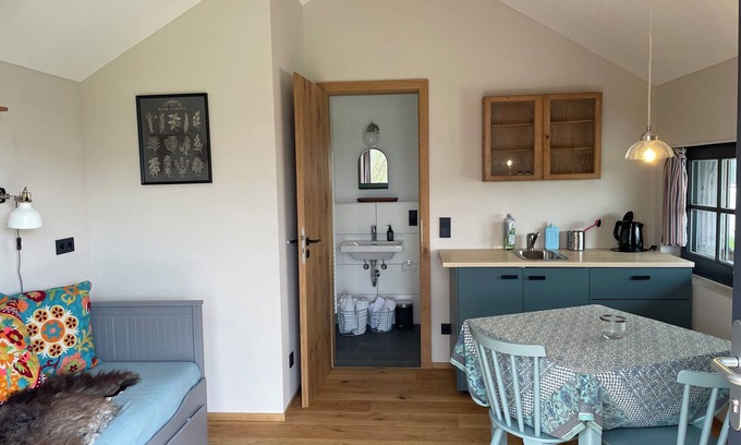 Breitbrunn a. Chiemsee Apartment | Tinyhouse with terrace and garden view, 25sqm