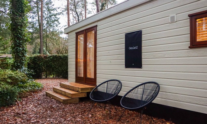 Municipality of Elburg Ski Chalet | Tranquil forest chalet by pond in Veluwe, pet-friendly & sleeps 4
