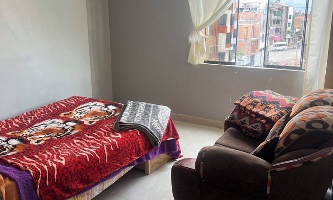 Chupaca Apartment | Travel's house in Cupaca has a shared living room and kitchen. For all V