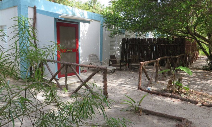 Placencia Apartment | Tropical garden experience in colorful setting in heart of Maya Beach