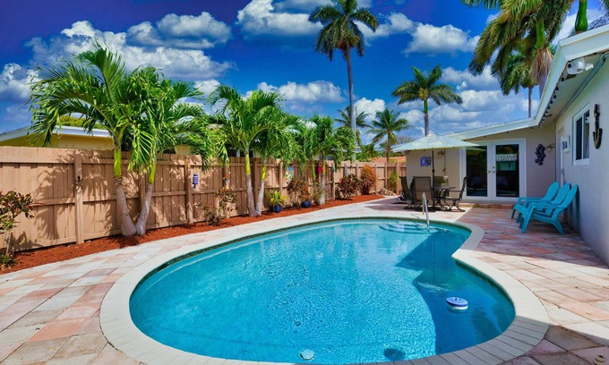 Cypress Point House | Tropical Getaway! Walking distance to beach & dining, private home, heated pool.