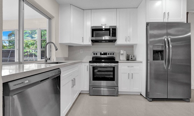 Tamarac House | Tropical Poolside Retreat in Tamarac - Lots of Activities!