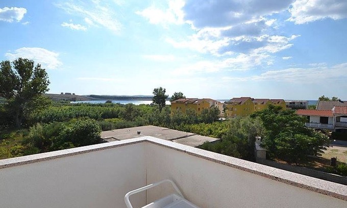 Povljana Apartment | Two bedroom apartment with terrace and sea view Povljana, Pag (A-12169-a)