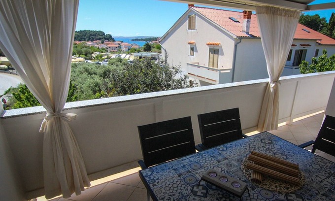 Palit Apartment | Two bedroom apartment with terrace and sea view Palit, Rab (A-4971-c)