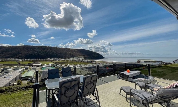 Aberystwyth House | Two bedroom caravan, sleeping four people, perfect for relaxing by the coast.