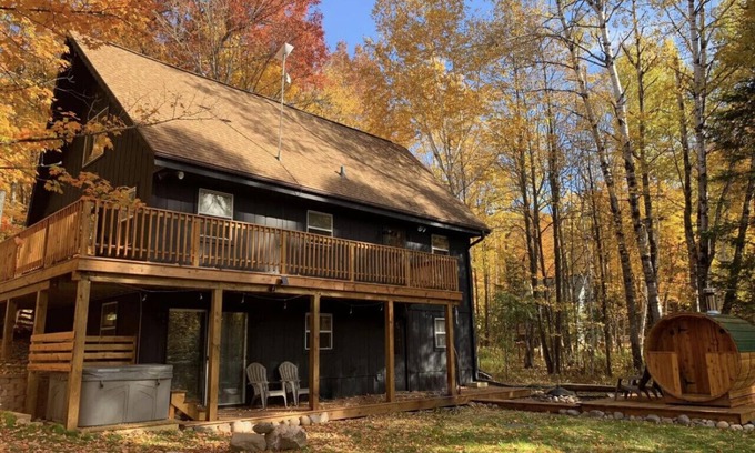 Stambaugh Ski Chalet | Two Bedroom Chalet Suite Steps From Ski Brule w/Outdoor Hot Tub & Sauna