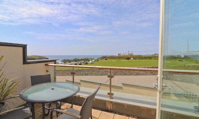 Treyarnon Apartment | Two storey apartment with balcony and sea views opposite the beach