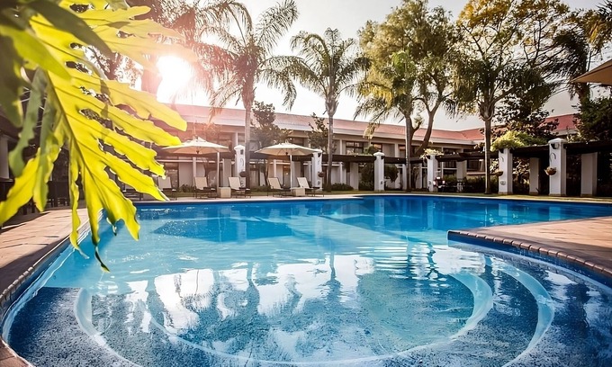 Gaborone Hotel | Ultimate Relaxation! Outdoor Pool, Spa, Airport Shuttle and FREE Parking!