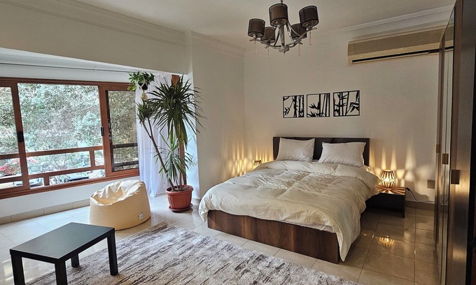 Maadi Apartment | Unbeatable Maadi 3BR: Prime Spot. A/C, WiFi, Free Amenities