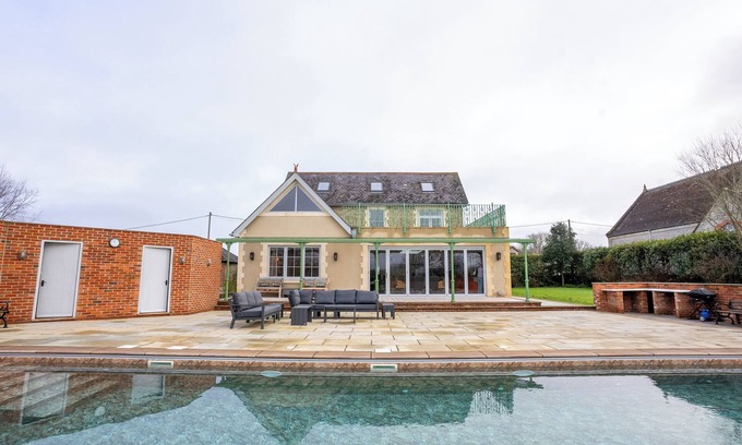 Shaftesbury House | Unique 7 Bedroom House with Skittle Alley, Seasonal Heated Pool and Playground.