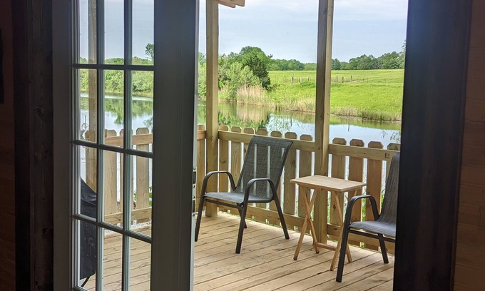 Jasonville Cabin | Unique cozy 14x40 Cabin with a nice deck by the water .