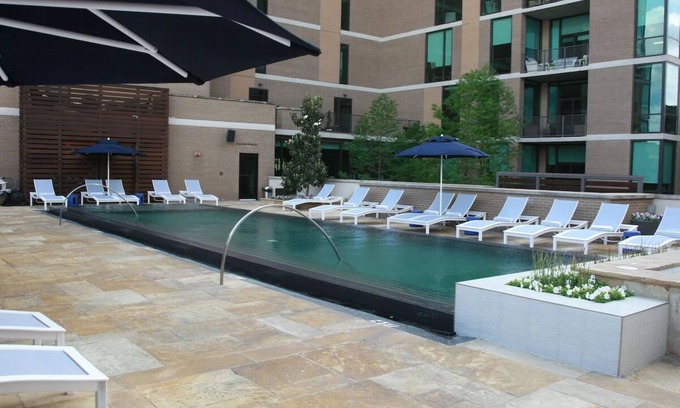 Glencoe Hotel | Urban Spa Haven: 4 Spacious Rooms with Pool, Steakhouse & Steps from Katy Trail