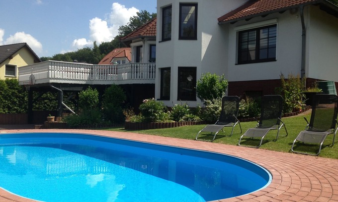 Ballenstedt House | Vacation home for 8 guests with pool, fireplace, playground, large garden
