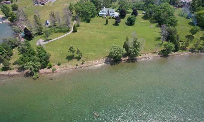 Ogdensburg House | Victorian 2 bedroom 1.5 bath townhome screened porch, view of St. Lawrence River