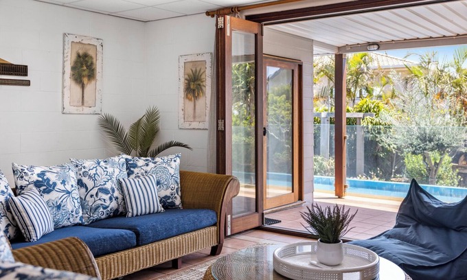 Emerald Beach House | Victoria’s Poolside Emerald Beach stay with Shared Pool, Near Beach and Cafes.