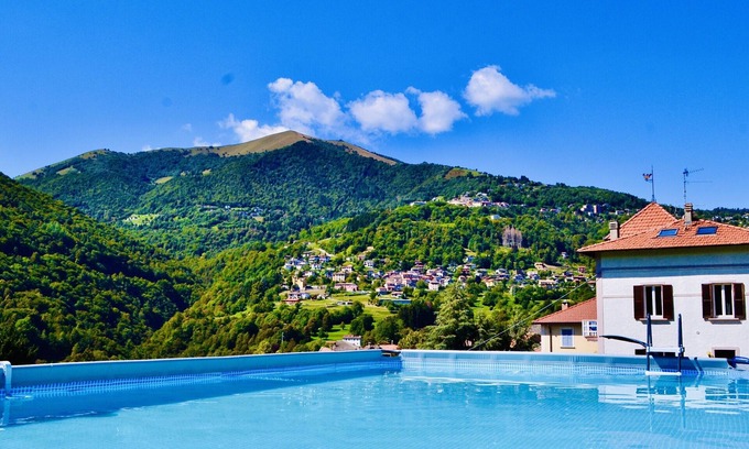 Dizzasco Villa | Villa Oleandra with panoramic view,big garden& swimming pool