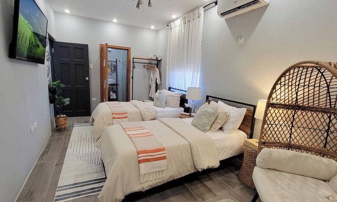 Silver Sands Villa | Villa on the Rock ~ Luxury vacation rental near beach with Roof top lounge area