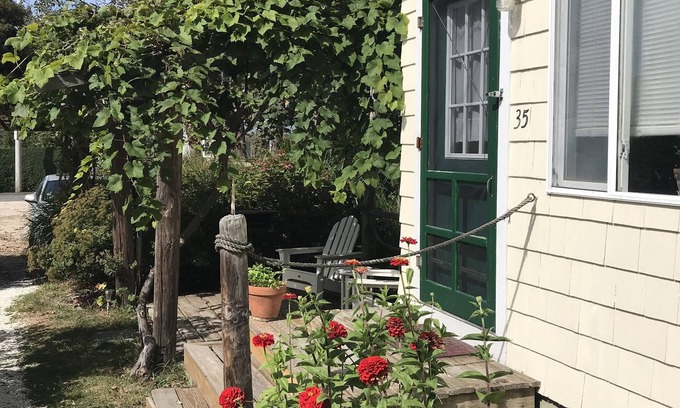 Newport East Cottage | Walk to Beach from sweet garden cottage. Monthly rate!