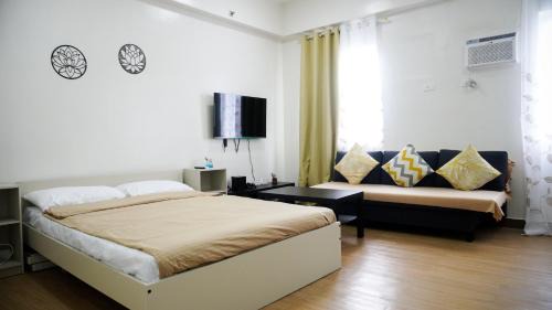 Trece Martires Apartment | Warm & Cozy Retreat near SM City Trece Martires
