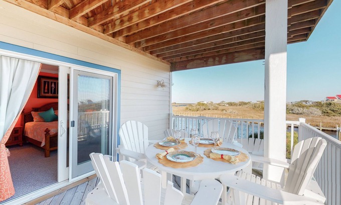 Hatteras Condo | Waterfront condo with pool, central AC, amazing views, & stylish decor
