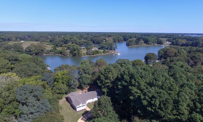 Weirwood House | Waterfront family home with great views, full kitchen, & strong Wi-Fi.