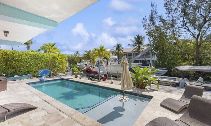 Key Largo House | Waterfront getaway w/stunning view, dockage, private pool, ping-pong, gas grill