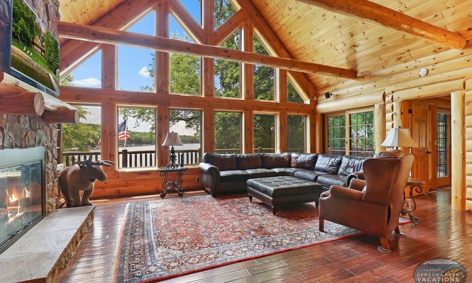 Whitewater House | Waterfront, Hand-Crafted Log Cabin |Sandy Beach |Dock |5200 Sq Ft |3.5 Acres |Stone Fireplace |Views