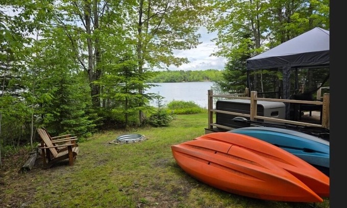 Mariaville Cottage | Waterfront home on Graham Lake with kayaks, bikes, firepit & fireplace