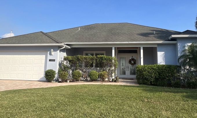 Palm City House | Waterfront house with dock, lift and hot tub