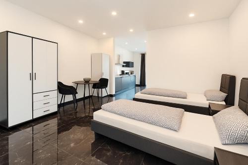 Loehne Apartment | Werre Apartments mit Smart-TV - stilvol, zentral & gemütlich