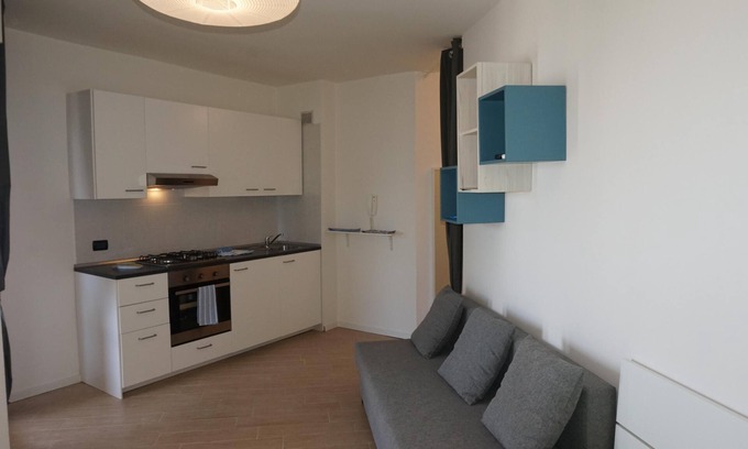 Lignano Sabbiadoro Apartment | White Black - Large one room apartment