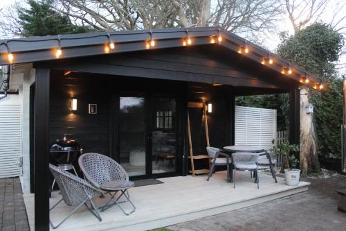 Chwilog Cabin | White River Retreats luxury lodges with Private Wood Fired Hot Tub