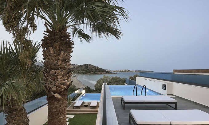 Almyros Villa | White Sand Villa - 3 Bedroom beachfront villa wit a heated pool