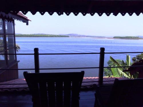 Ribandar Ski Chalet | WOODEN CHALET ON THE RIVER BANKS