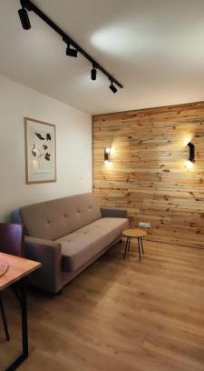 Siedlce Apartment | Wooden Dream with Terrace