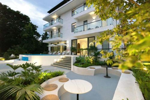Jinghong Hotel | Xishuangbanna Verdant House Resort Hotel