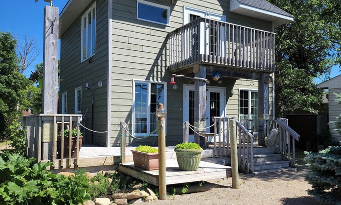 Grand Beach House | Year Round Waterfront Retreat