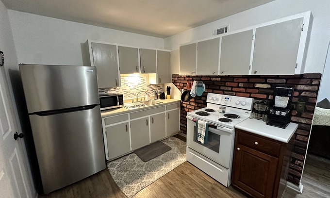 Tulsa House | Yellow House with the Red Door - 5 minute drive to Catoosa Hardrock Casino!