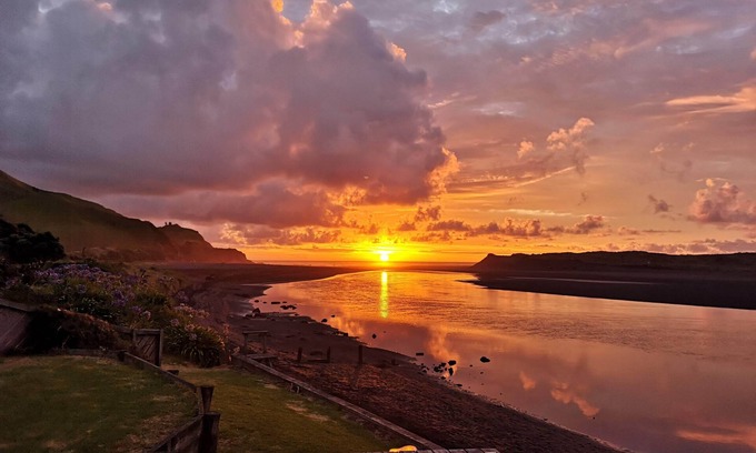Waitomo District House | You can't get closer to the water if you tried