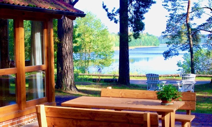 Rutenberg House | Your beautiful house on the lake with a fireplace, sauna and great lake view! With e-charging station